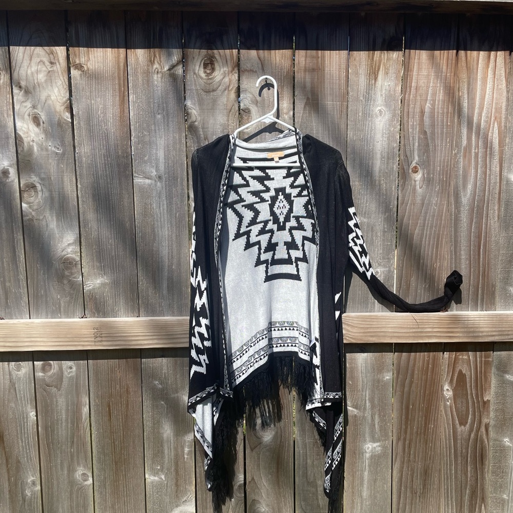 Black-and-white cardigan with fringe